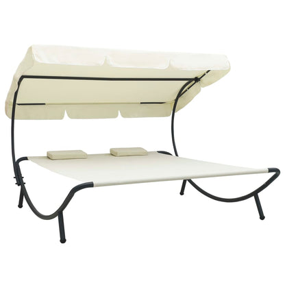 Tumbona de exterior con dosel y almohadas blanco crema